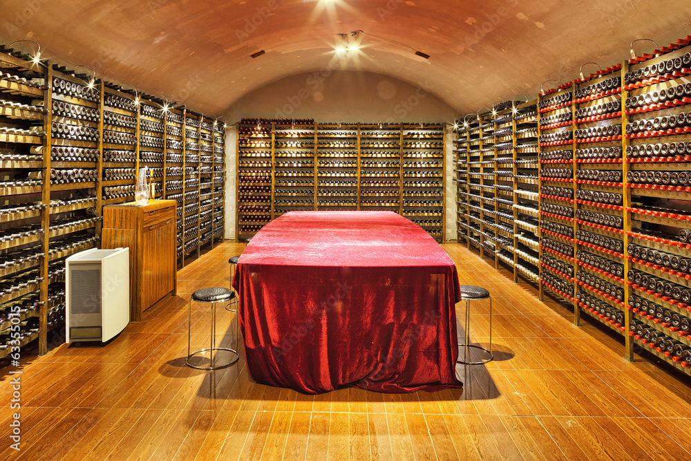 Wine cellar with wine bottle and glasses