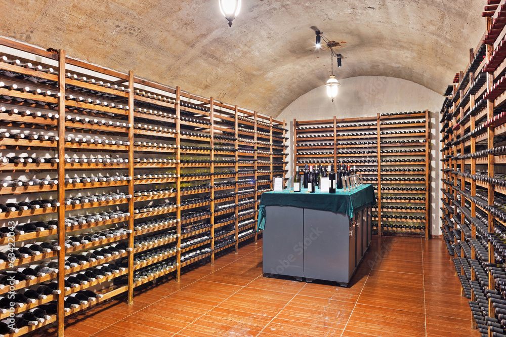 Wine cellar with wine bottle and glasses