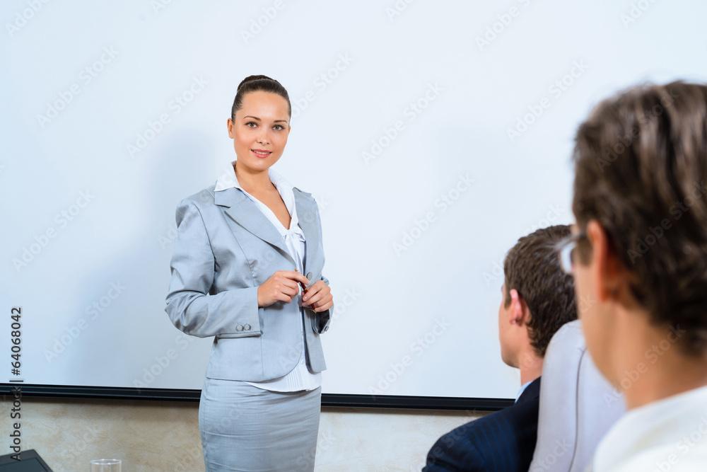 discusses business woman with colleagues