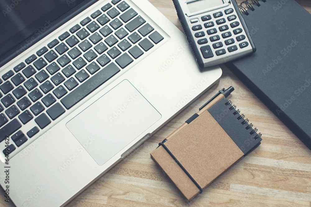 A laptop, a diary and a calculator