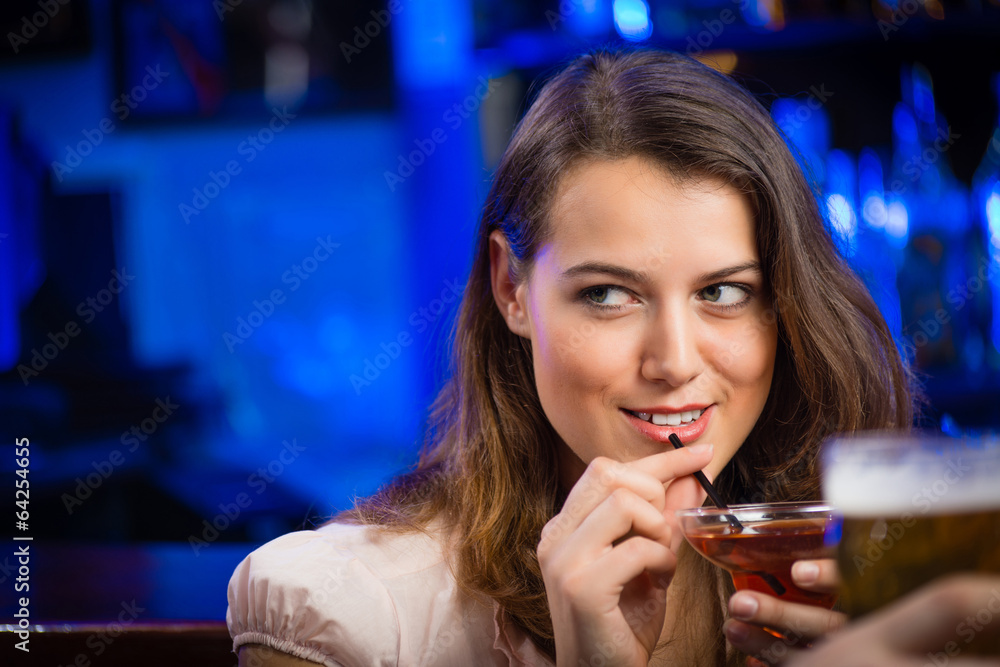 young woman in a bar