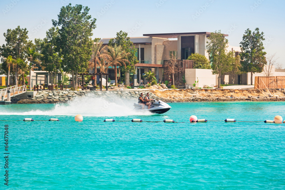 Couple on the jetski ride in Abu Dhabi, UAE