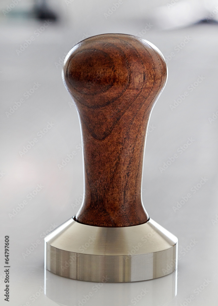 Ground coffee tamper