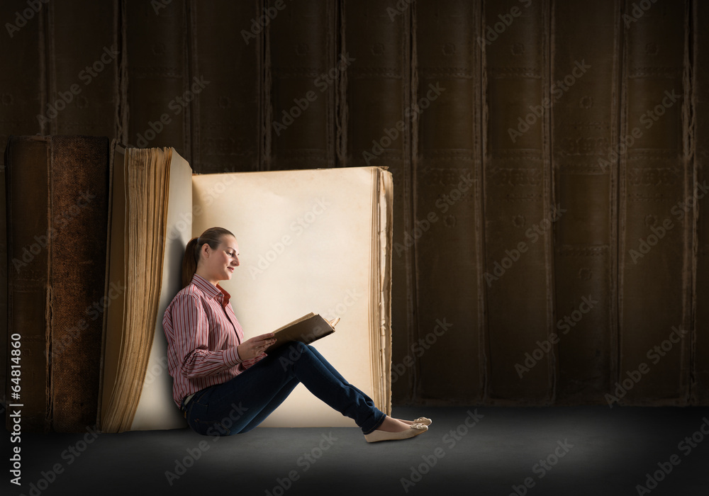 young woman reading a book