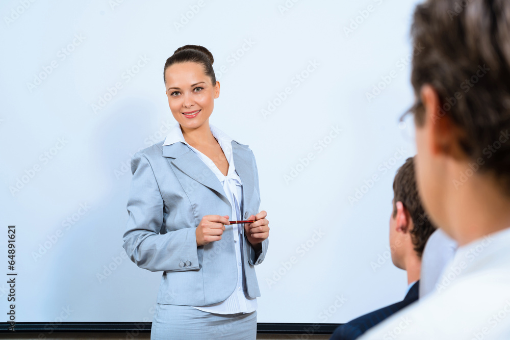 discusses business woman with colleagues