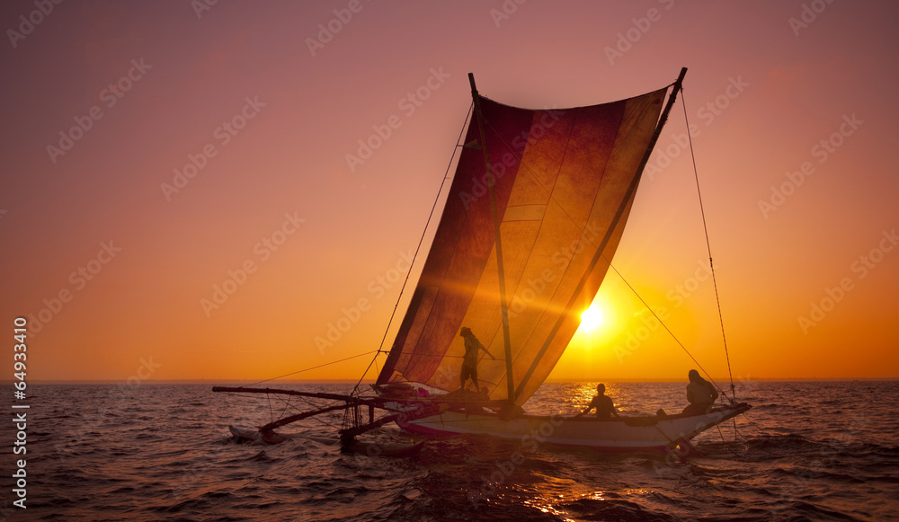 Sailing on a Catamaran at Sunset