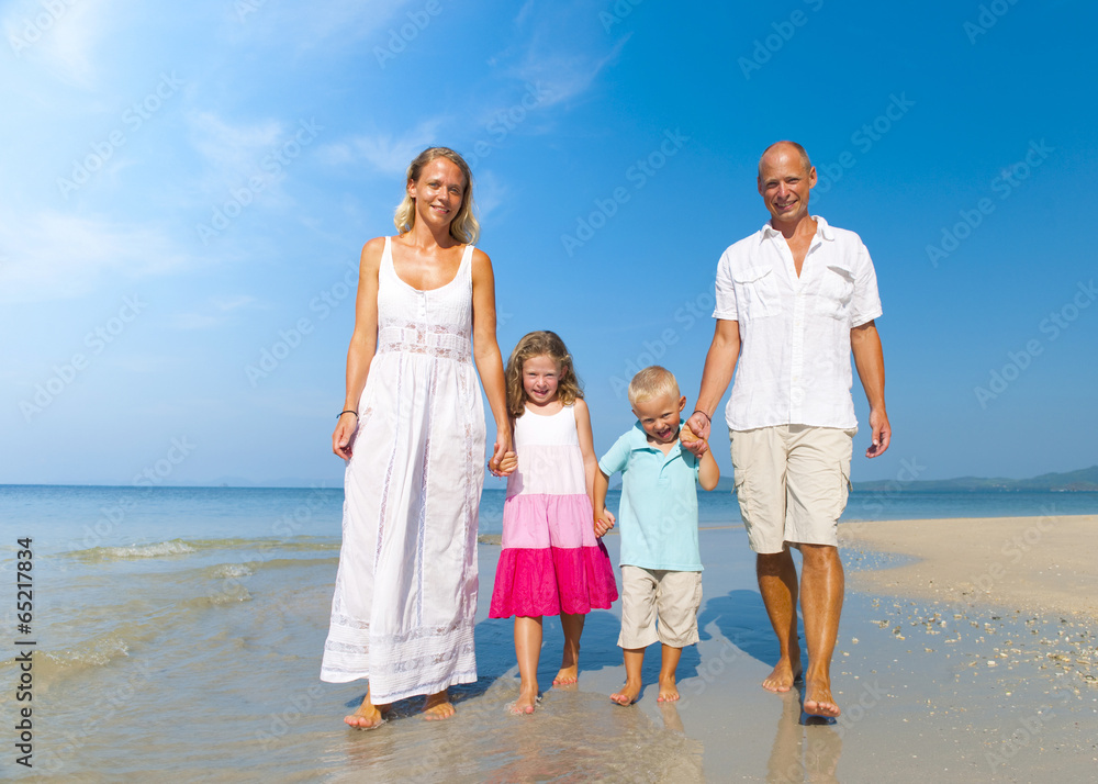 Family walking on beach