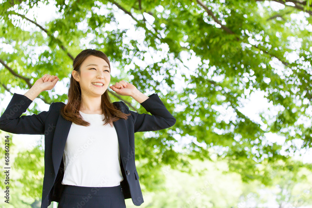 young asian woman on green background