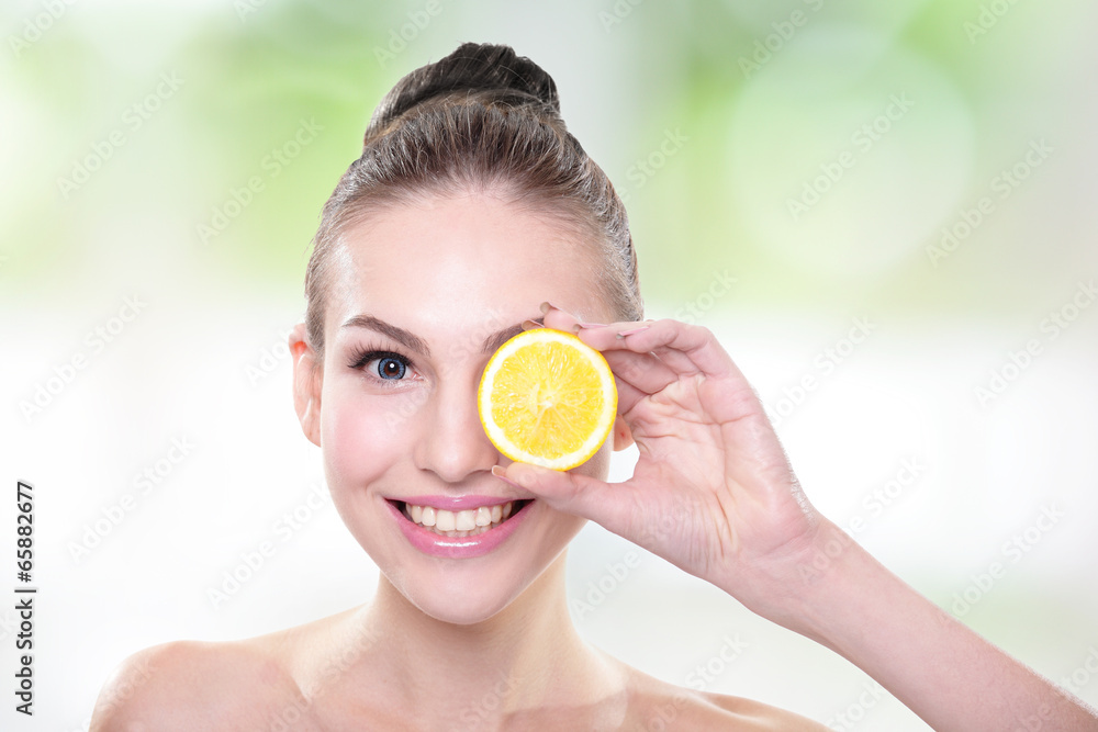 Beautiful woman face with orange