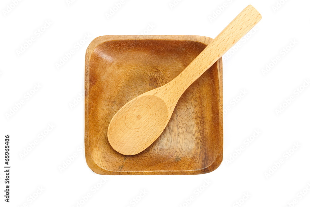 Empty wooden dish and spoon isolated on white background