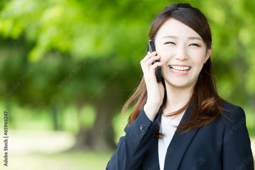 asian businesswoman using smart phone