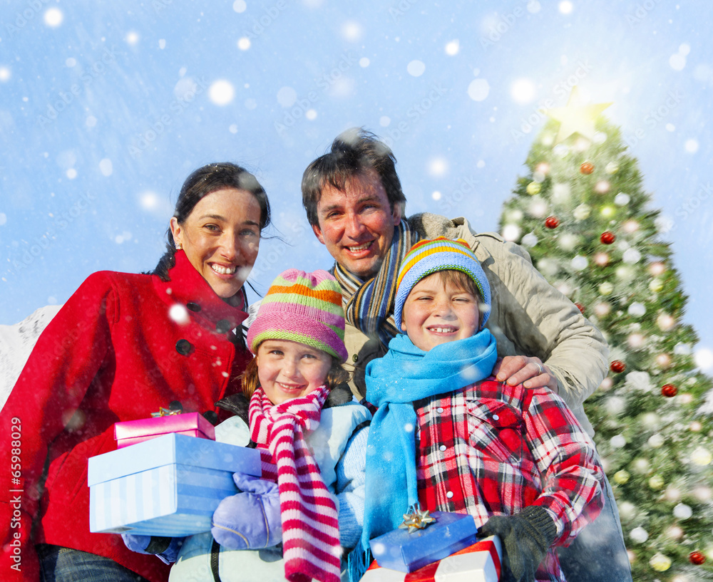 Happy Family Holding Christmas Gift