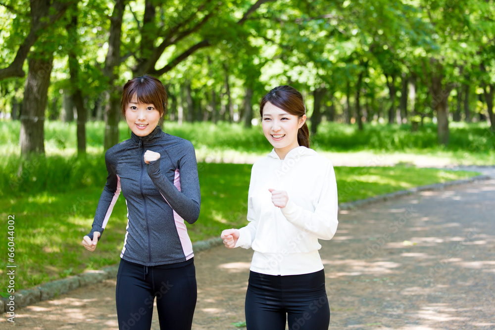 young asian women jogging in the park