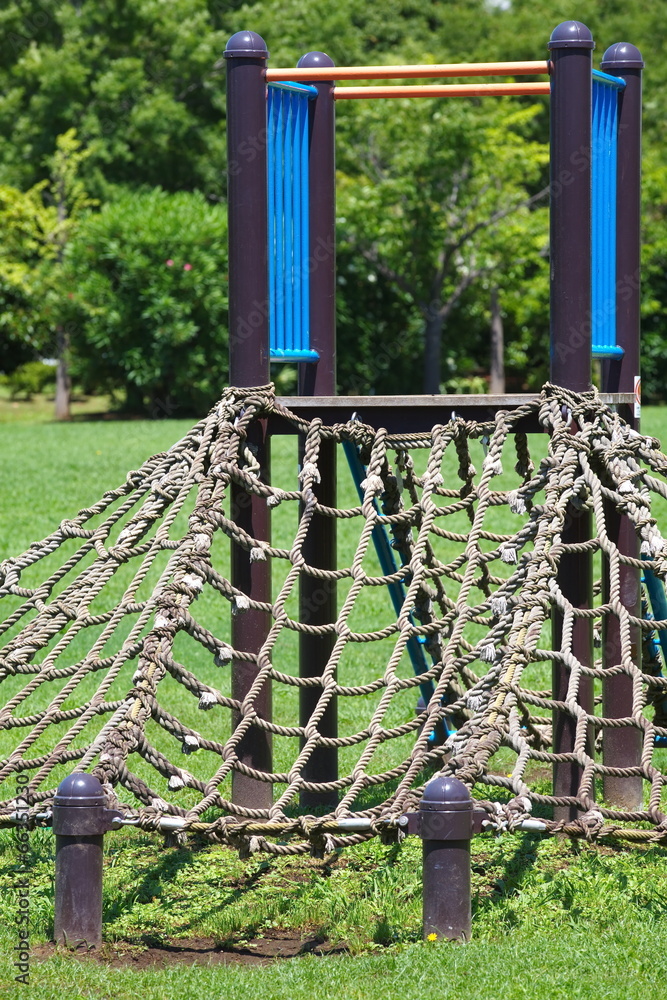 children playground at pubic park in summer season