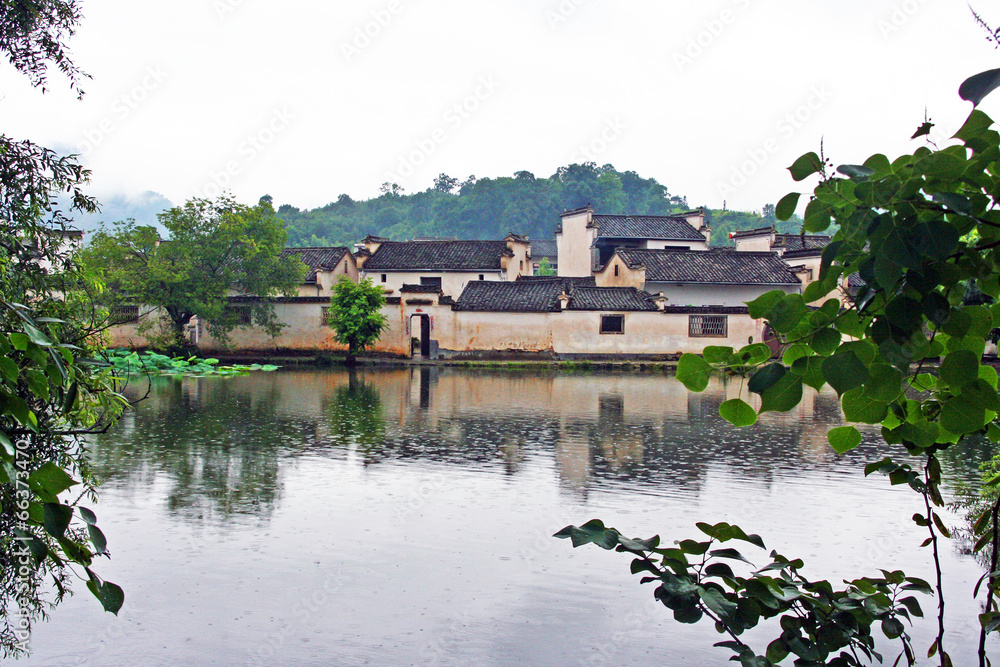 Hongcun village enshrouded with mist in Anhui province, China