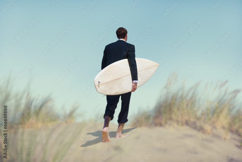 Businessman with Surfboard Going to the Beach