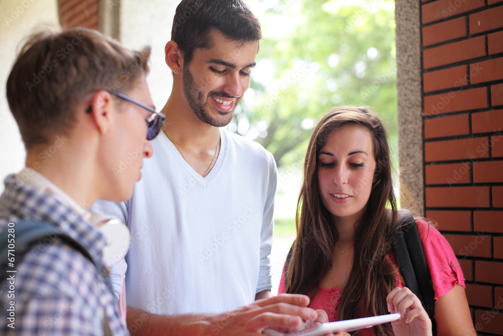 Happy College students using computer