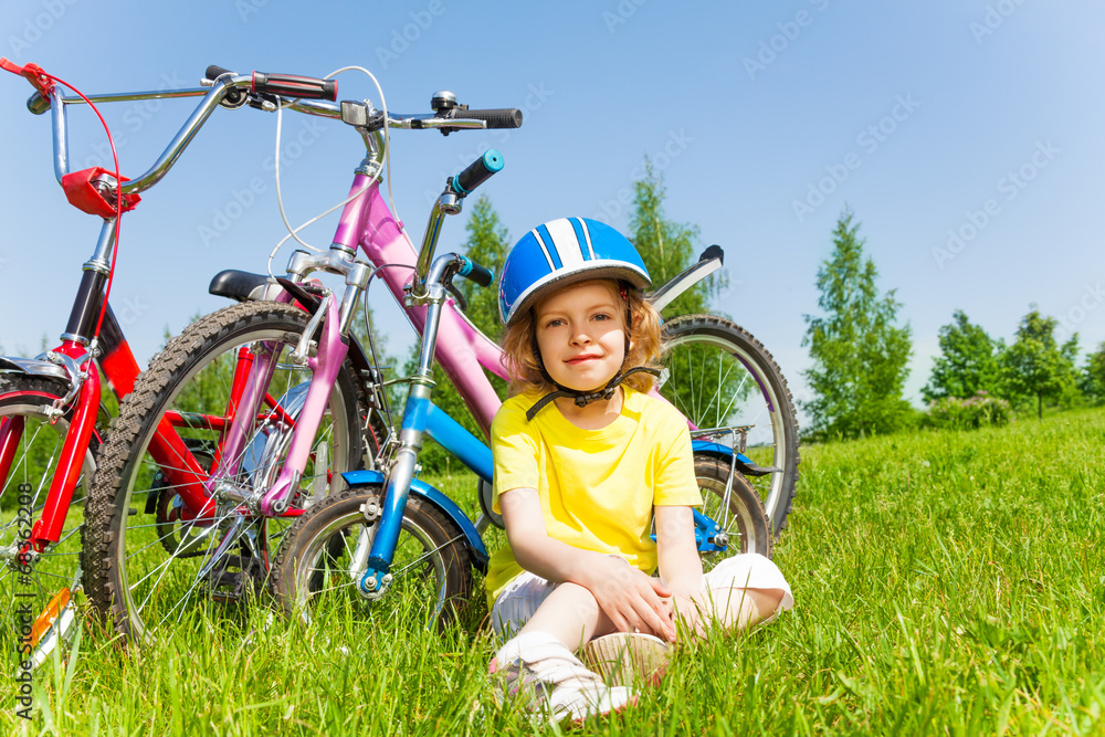 Shot of a little girl with bicycles