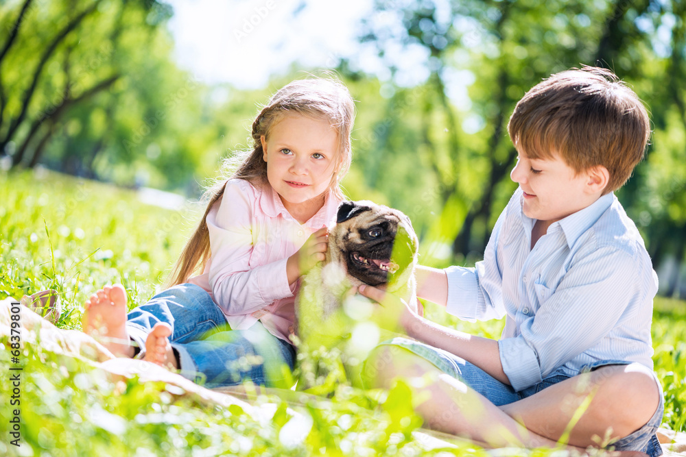 Children in park with pet