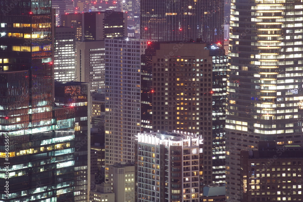 Close - up Hi building in Tokyo city at night