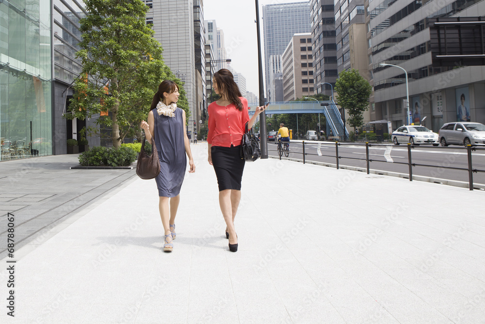 Young women who walk the business district