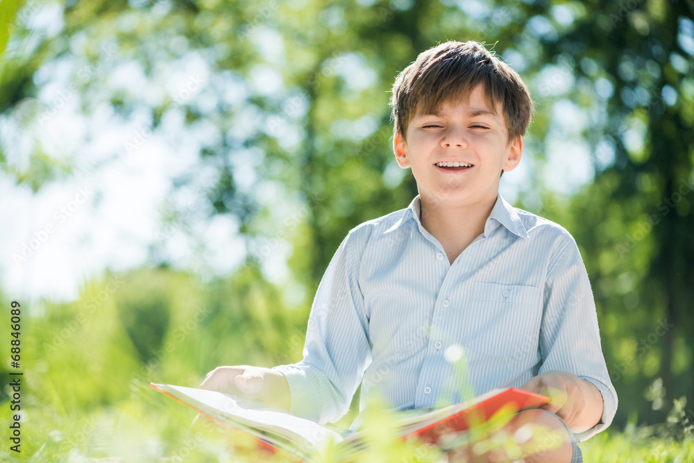 Boy in summer park