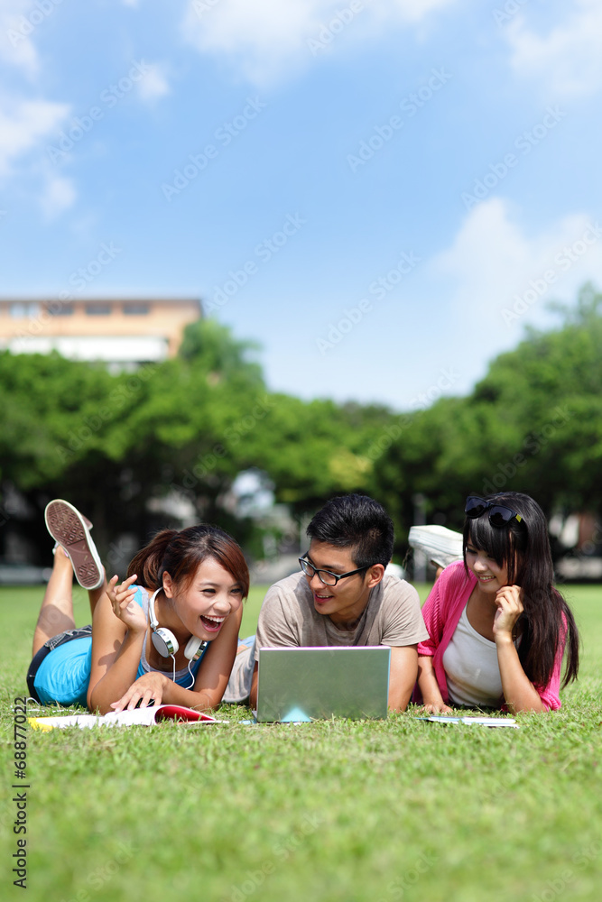 Happy College students using computer