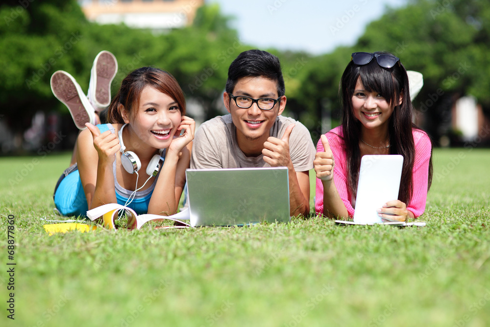 Happy College students using computer