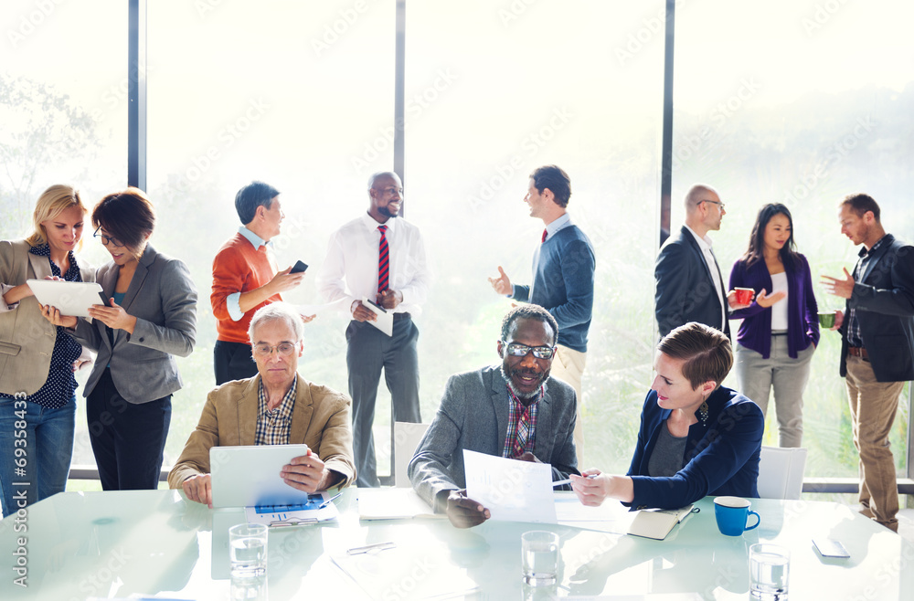 Group of Business People Discussing in the Office