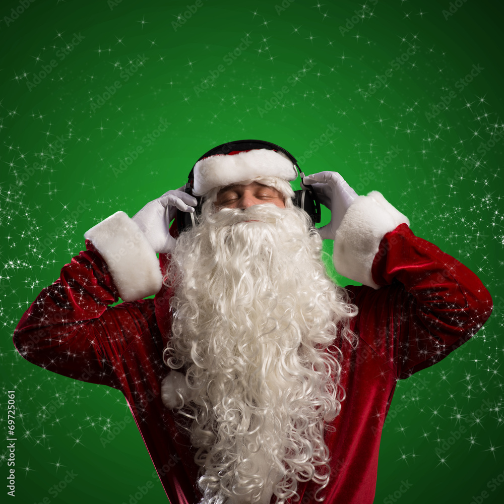 Santa Claus is listening to music