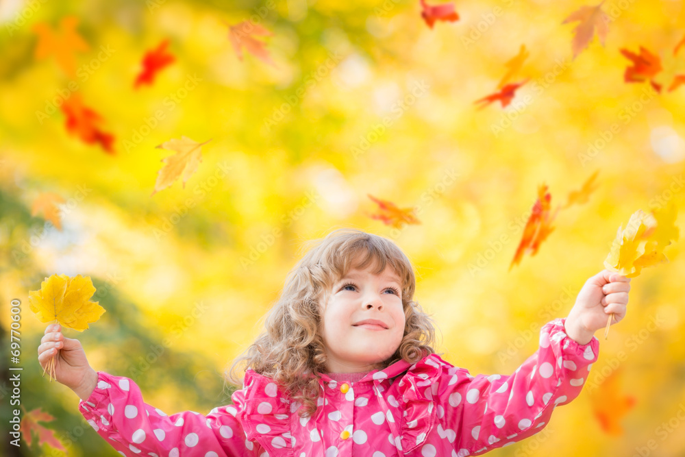 Child in autumn park