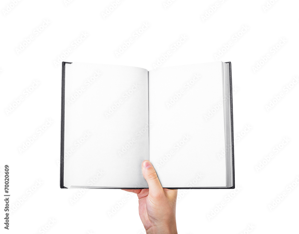 hand holding a blank book