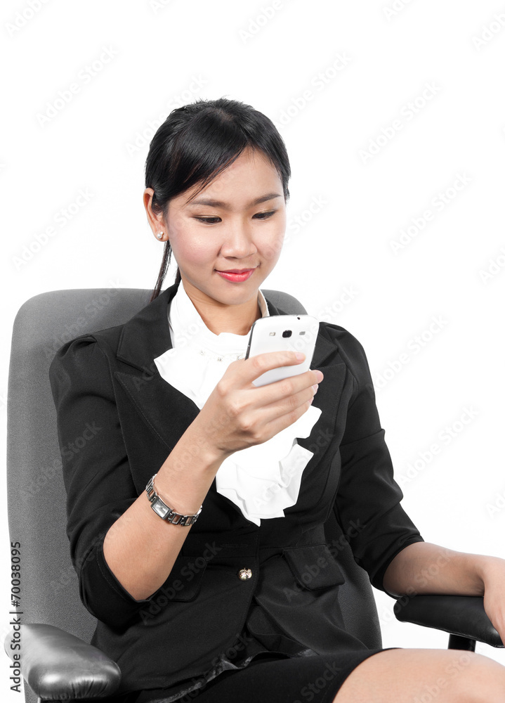 Young pretty business woman using mobile phone