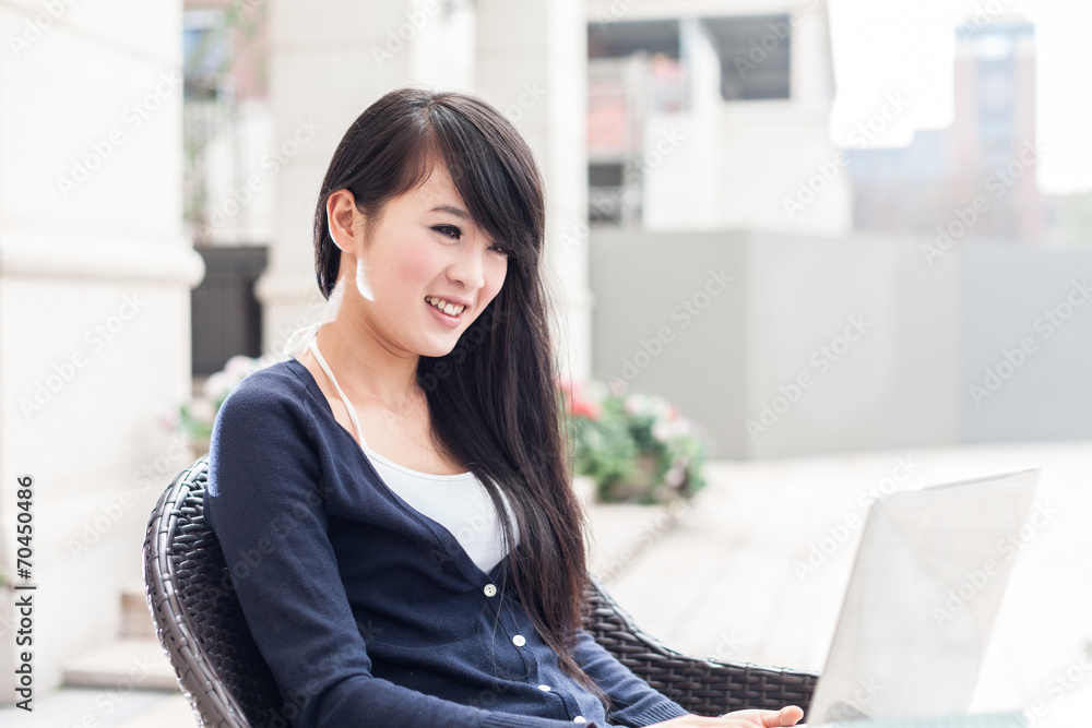 Young woman using computer