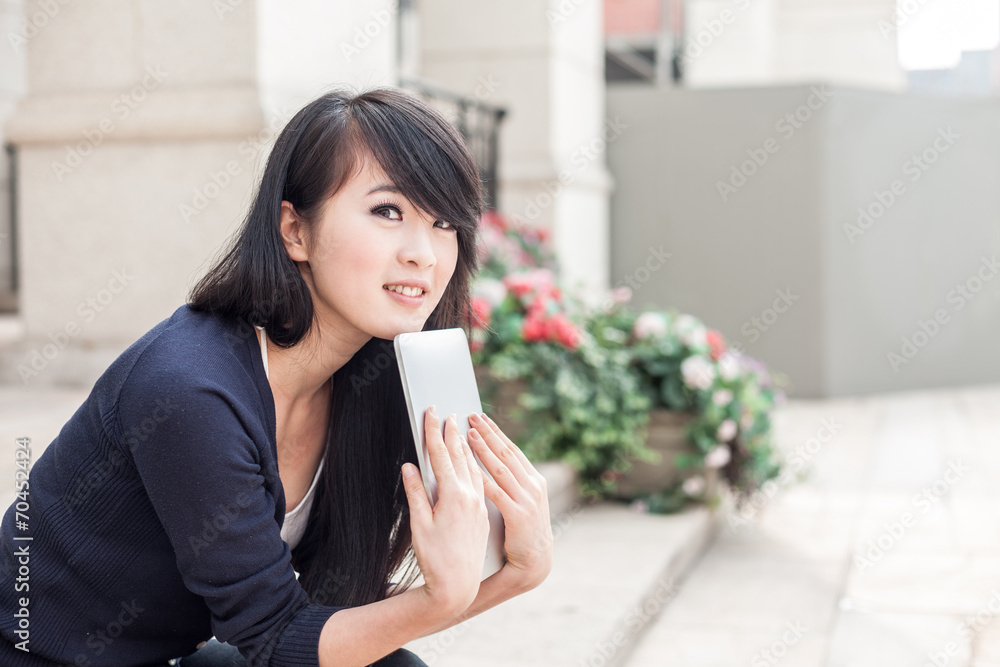 young asian woman with laptop