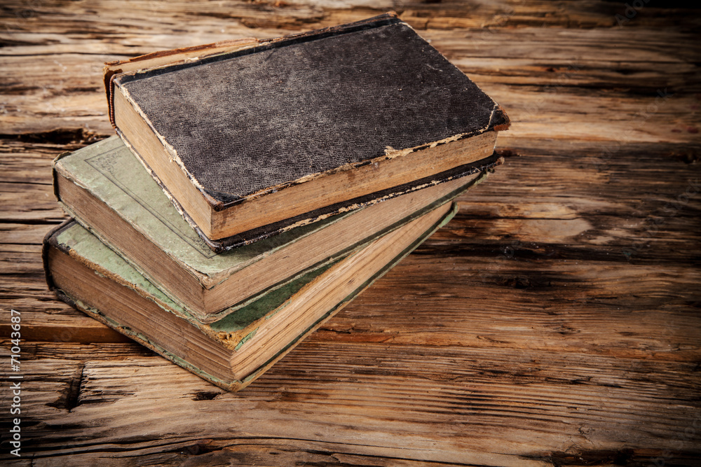 Old books on wooden table