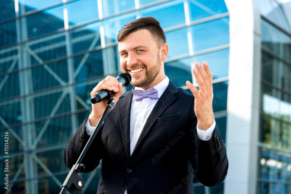 Portrait of well-dressed man on the contempopary background