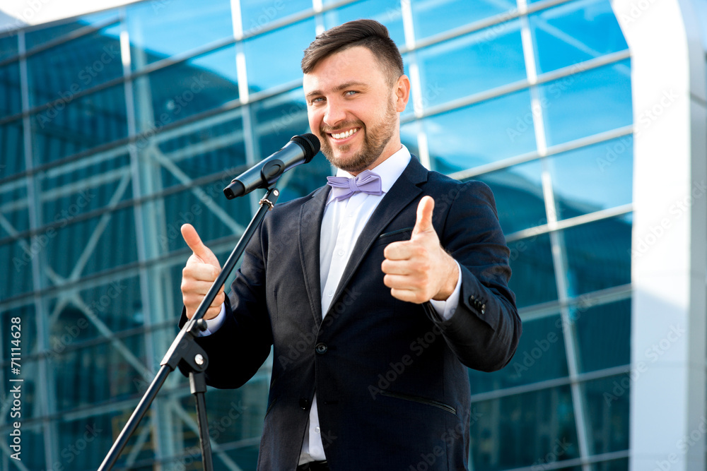 Portrait of well-dressed man on the contempopary background