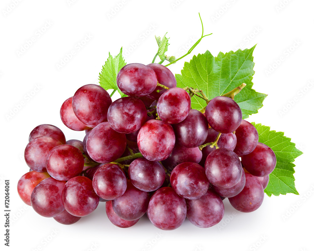 Ripe red grape with leaves isolated on white