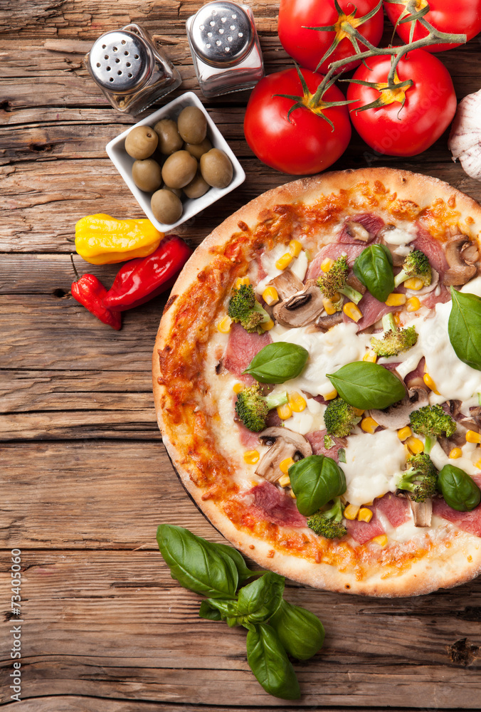 Delicious fresh pizza served on wooden table