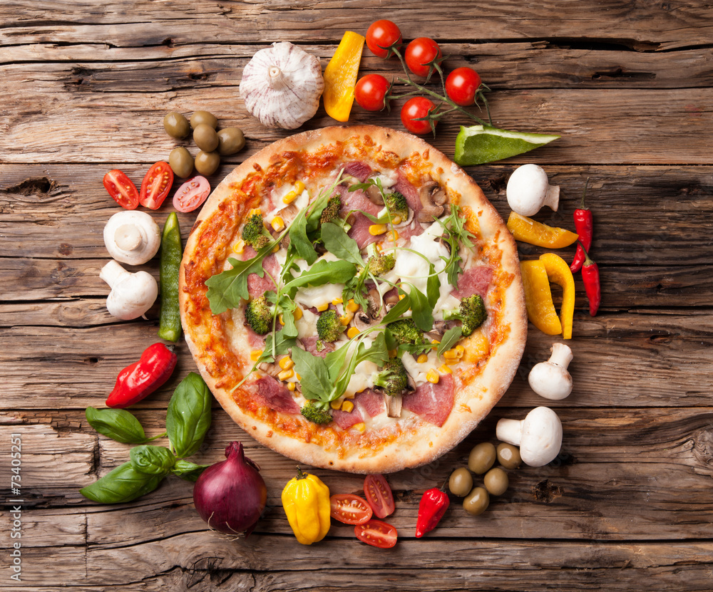 Delicious fresh pizza served on wooden table