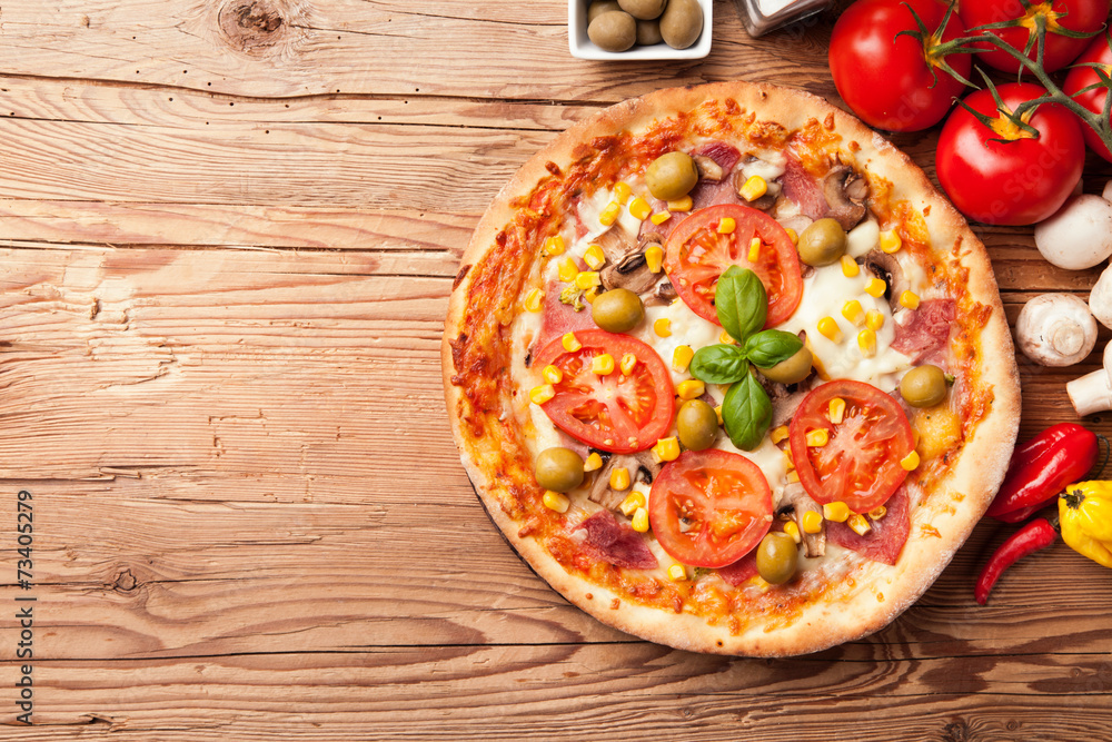 Delicious fresh pizza served on wooden table