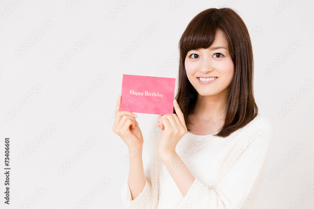 young asian woman with gift on white background