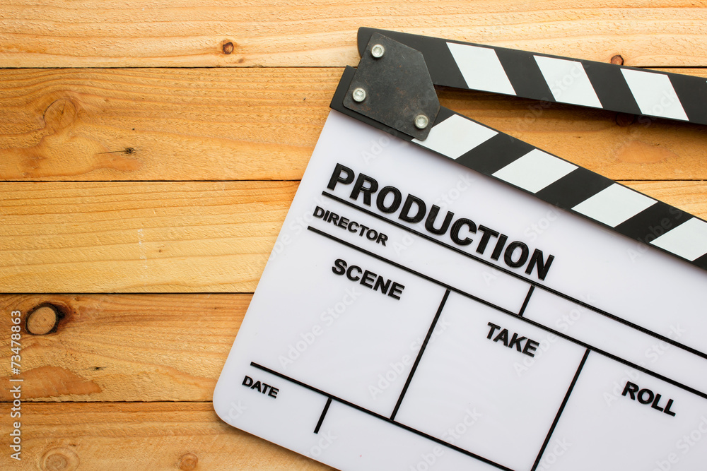 Movie slate film on wooden table