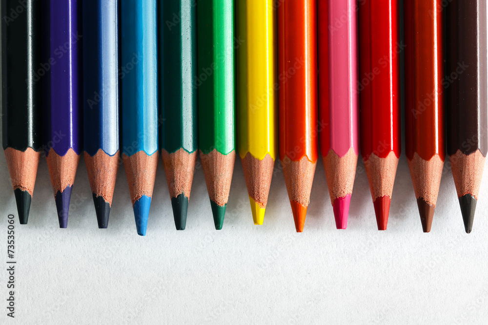 Colorful pencils arranged as a color pallete, isolated.