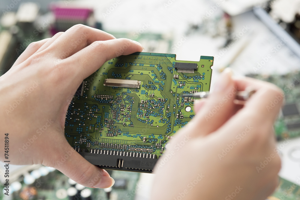 Hand holding a computer parts