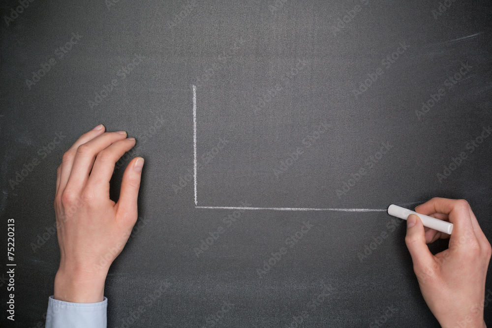 Businesswoman Drawing a Chart