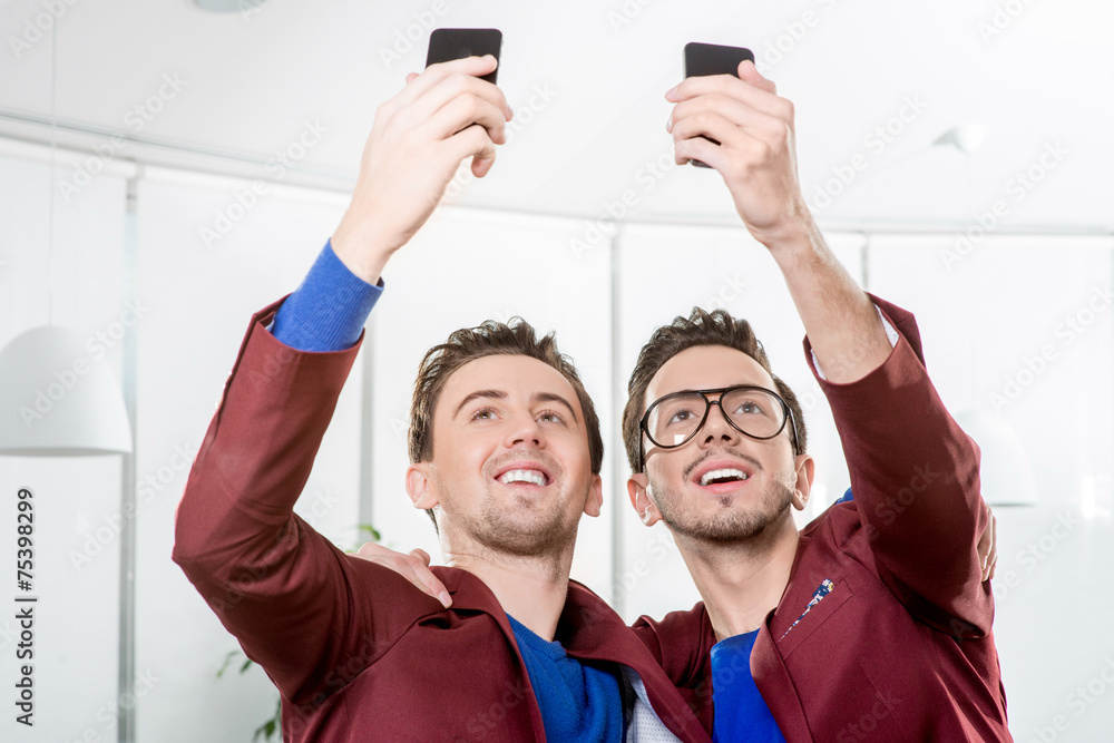 Brothers twins taking selfie photo