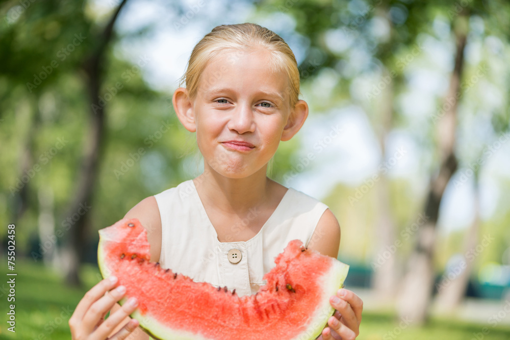 Kid with watermelon slice