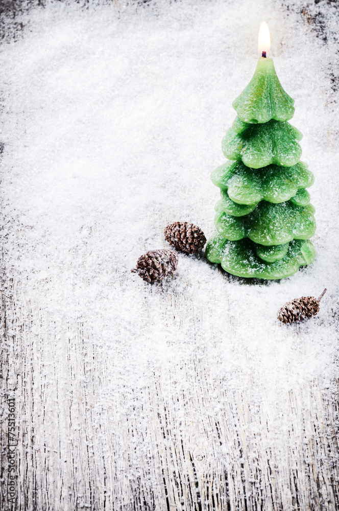 Festive background with Christmas tree candle